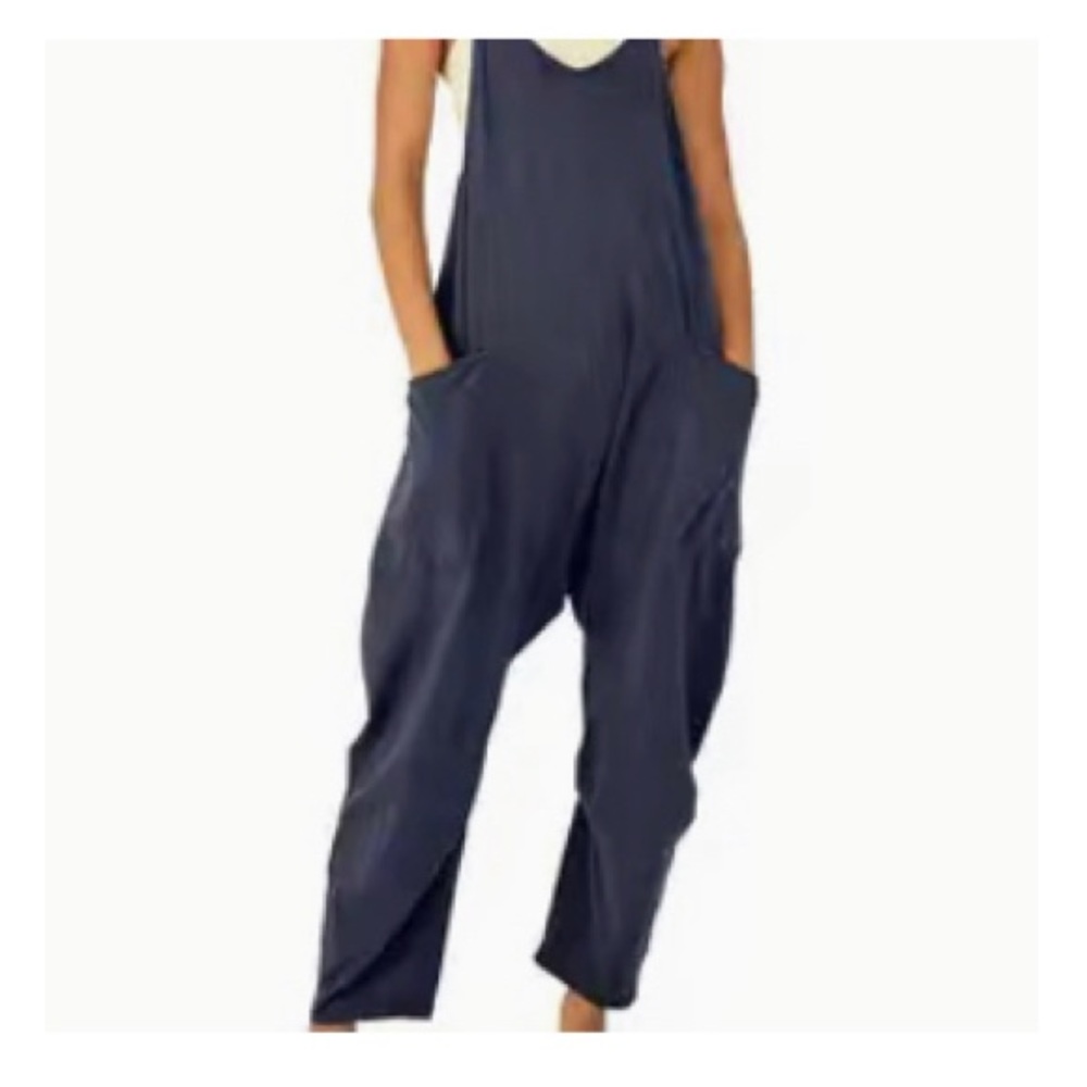 Wide leg jumper, romper with front pockets, and one back zipper pocket